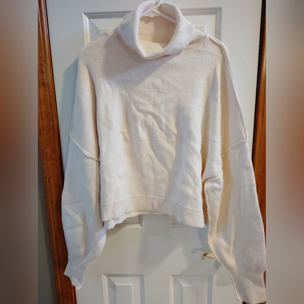 Elegant Light Pink Turtleneck Sweater